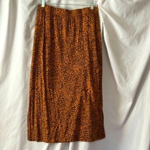 Mid length animal print shirt.  Never worn.